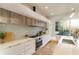 Bright kitchen featuring stainless steel appliances, light countertops, and backsplash at 1045 Shepherds Ne Ln, Atlanta, GA 30324