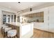 Bright, open kitchen with large island, modern appliances, and hardwood floors at 1045 Shepherds Ne Ln, Atlanta, GA 30324