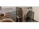 Laundry room featuring a modern washer and dryer at 1045 Shepherds Ne Ln, Atlanta, GA 30324