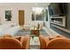 Beautiful living room with modern fireplace and large windows to let in plenty of natural light at 1045 Shepherds Ne Ln, Atlanta, GA 30324