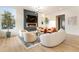 Comfortable living room featuring contemporary furnishings, modern fireplace, and ample natural light at 1045 Shepherds Ne Ln, Atlanta, GA 30324