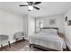 Bedroom with neutral paint, a ceiling fan and hardwood floors, plus great natural light at 2072 Baker Nw Rd, Atlanta, GA 30318