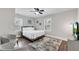 Bedroom with neutral paint, a ceiling fan and hardwood floors, plus great natural light at 2072 Baker Nw Rd, Atlanta, GA 30318