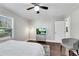 Bedroom with neutral paint, a ceiling fan and hardwood floors, plus great natural light at 2072 Baker Nw Rd, Atlanta, GA 30318
