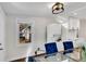 Bright dining room featuring modern table, chairs, lighting and a washer/dryer combo unit at 2072 Baker Nw Rd, Atlanta, GA 30318