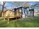 Charming exterior view showcasing a well-maintained home with a newly constructed wooden back deck at 2072 Baker Nw Rd, Atlanta, GA 30318