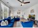 Bright and spacious living room featuring a large sectional sofa and contemporary furnishings at 2072 Baker Nw Rd, Atlanta, GA 30318