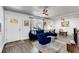 Elegant living area with a comfortable seating arrangement and a view of the front door at 2072 Baker Nw Rd, Atlanta, GA 30318