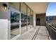 Spacious outdoor balcony with metal railings and floor-to-ceiling windows at 3400 Malone Dr # 110, Atlanta, GA 30341