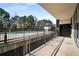 A view from the condo balcony shows the nearby community pool, perfect for outdoor living at 3400 Malone Dr # 110, Atlanta, GA 30341