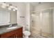 Bathroom featuring a vanity, toilet, and shower with glass doors at 3400 Malone Dr # 110, Atlanta, GA 30341