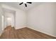 Spacious bedroom with hardwood floors, neutral paint, closet and ensuite bathroom access at 3400 Malone Dr # 110, Atlanta, GA 30341
