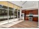 Modern kitchen with stainless steel appliances, granite countertops, and access to a patio with a pool view at 3400 Malone Dr # 110, Atlanta, GA 30341