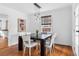 Chic dining room featuring a modern light fixture and comfortable seating at 1824 Windemere Ne Dr, Atlanta, GA 30324