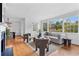 Well-lit living room with a large window and a comfortable seating arrangement at 1824 Windemere Ne Dr, Atlanta, GA 30324