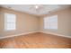 Spacious bedroom with hardwood floors and natural lighting at 104 Providence Dr, Carrollton, GA 30116