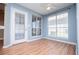 Bright dining area with an exterior door to access the backyard and fenced in patio at 104 Providence Dr, Carrollton, GA 30116