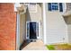 Home entrance featuring a dark front door with sidelights and a sidelight window at 104 Providence Dr, Carrollton, GA 30116