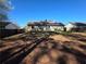 View of a backyard featuring a full fence on a sunny day at 325 Villa Rosa Way, Temple, GA 30179