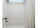 Bathroom showing white subway tile in shower with brushed nickel plumbing fixtures at 513 Beecham Dr, Smyrna, GA 30082