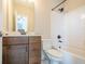 Stylish bathroom with a modern vanity, white subway tile shower, and sleek fixtures at 513 Beecham Dr, Smyrna, GA 30082