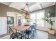 Chic dining room with coffered ceilings, modern lighting, and neutral decor at 513 Beecham Dr, Smyrna, GA 30082