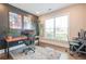 Modern home office with dark accent wall and large window at 513 Beecham Dr, Smyrna, GA 30082