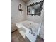 Bathroom featuring a large jetted tub and ornate mirror at 92 Indian Lake Ct, Hiram, GA 30141