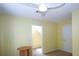 A cozy bedroom with yellow walls, neutral carpet and ceiling fan at 92 Indian Lake Ct, Hiram, GA 30141