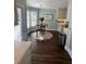 View of kitchen dining area with flowers, decor, table, and hardwood flooring at 92 Indian Lake Ct, Hiram, GA 30141