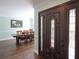 Inviting foyer with rich wood floors and a view of the dining room at 92 Indian Lake Ct, Hiram, GA 30141