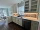 A well-lit kitchen featuring countertops, cabinets, and a sink at 92 Indian Lake Ct, Hiram, GA 30141