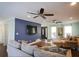 Relaxing living room with blue accent wall, plenty of natural light and an open concept layout at 92 Indian Lake Ct, Hiram, GA 30141