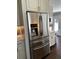 A stainless steel refrigerator, cabinets, and countertops in a well-lit kitchen at 92 Indian Lake Ct, Hiram, GA 30141