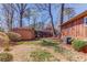 The well-maintained backyard features a storage shed and the home's air conditioning unit at 2685 Whippoorwill Cir, Duluth, GA 30097