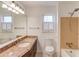 Bathroom featuring neutral tile, vanity, and tub shower at 2685 Whippoorwill Cir, Duluth, GA 30097