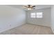 Bedroom with neutral carpet, large windows, and great natural light at 2685 Whippoorwill Cir, Duluth, GA 30097