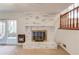 Living room with fireplace and sliding door at 2685 Whippoorwill Cir, Duluth, GA 30097