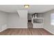 Basement space with staircase, and wood-look flooring at 3671 Satellite Blvd, Ellenwood, GA 30294