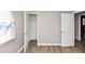 A bright bedroom with a closet offers ample storage and natural light at 3671 Satellite Blvd, Ellenwood, GA 30294