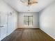 Bedroom featuring carpet flooring, a ceiling fan, and windows at 3756 Brookwood Blvd, Rex, GA 30273