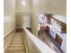 Foyer with stairs leading down to the kitchen area featuring white appliances at 3756 Brookwood Blvd, Rex, GA 30273