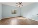 Bedroom features hardwood flooring, natural light, and a ceiling fan at 1800 Clairmont #428 Lk # A428, Decatur, GA 30033