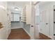 Organized walk-in closet with built-in shelves and ample storage space at 1800 Clairmont #428 Lk # A428, Decatur, GA 30033