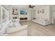 Comfortable living room area featuring a fireplace, TV, and light wood flooring at 1811 Penny Nw Ln, Lawrenceville, GA 30043