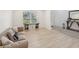 Inviting living room with comfortable seating, stylish console table, and ample natural light at 1811 Penny Nw Ln, Lawrenceville, GA 30043