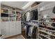 Spacious walk-in closet with custom shelving and ample storage at 208 Jefferson Cir, Atlanta, GA 30328