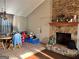 Cozy living room with vaulted ceilings and a stunning stone fireplace at 3511 Flint Ave, Ellenwood, GA 30294