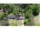 Aerial view showcasing the properties with mature trees, well-maintained lawns, and surrounding neighborhood at 4323 E Durham Cir, Stone Mountain, GA 30083