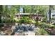 Charming backyard featuring a circular stone patio with comfortable seating at 4323 E Durham Cir, Stone Mountain, GA 30083
